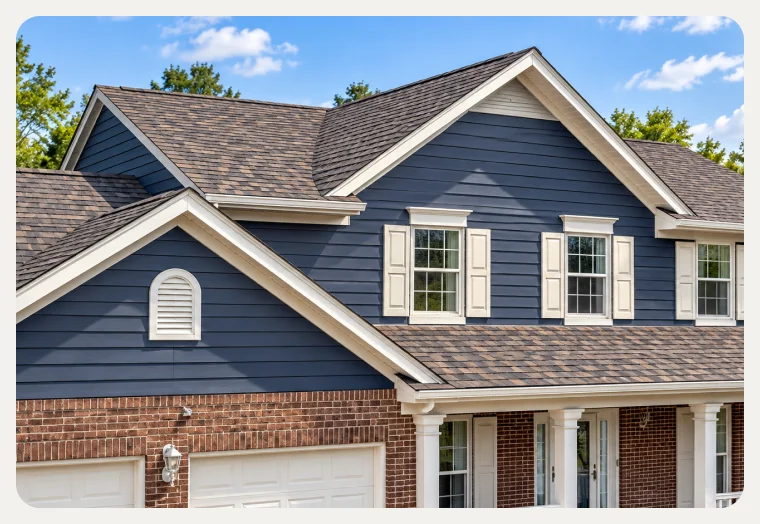 Two-story home with a new shingle roof